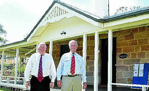 Auctioneer Stuart Bond and PRD Nationwide principal Robert Koremans at The Glen, which went to auction yesterday. Auctioneer Stuart Bond and PRD Nationwide principal Robert Koremans at The Glen, which went to auction yesterday.